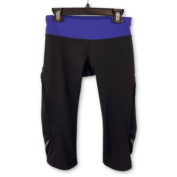 Lululemon Black w/ Blue Ruffle Accent Zipper Waistband Pocket Capri Leggings 4 - Picture 1 of 9